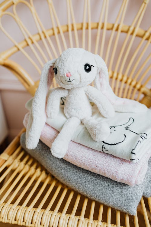 Free Plush Toy in Top of Blankets Stock Photo