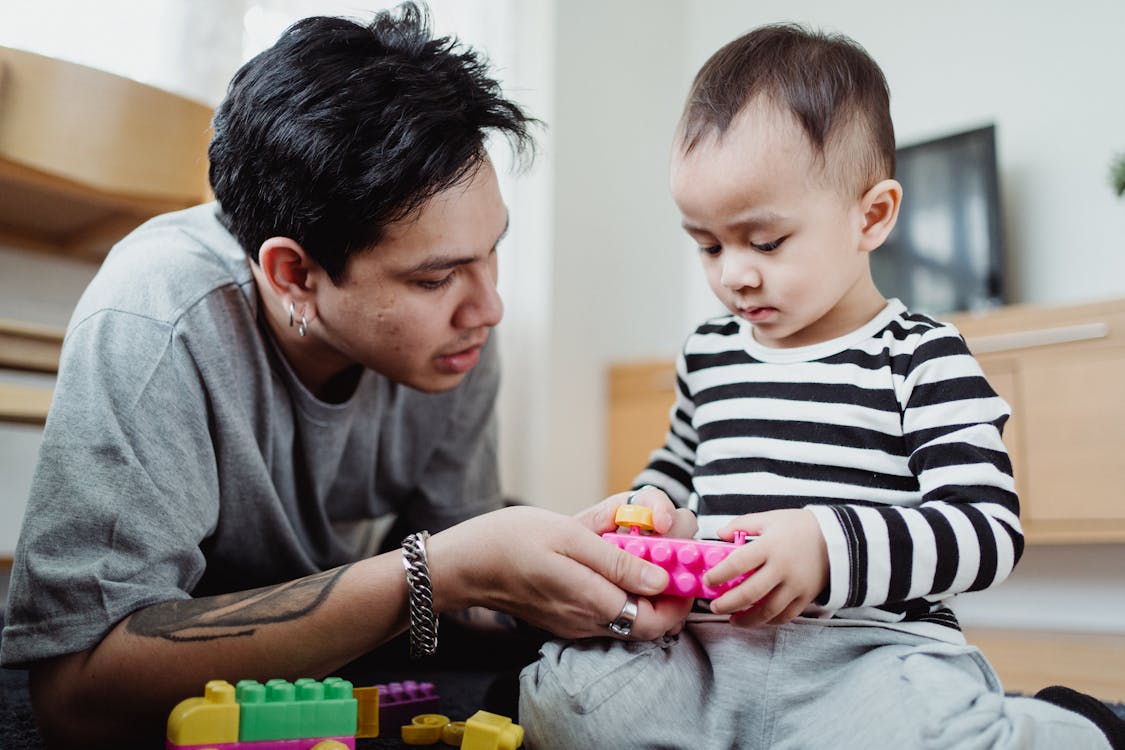 Free A Father Playing with His Son Stock Photo