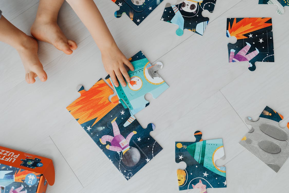 Free A Child Playing Puzzles Stock Photo